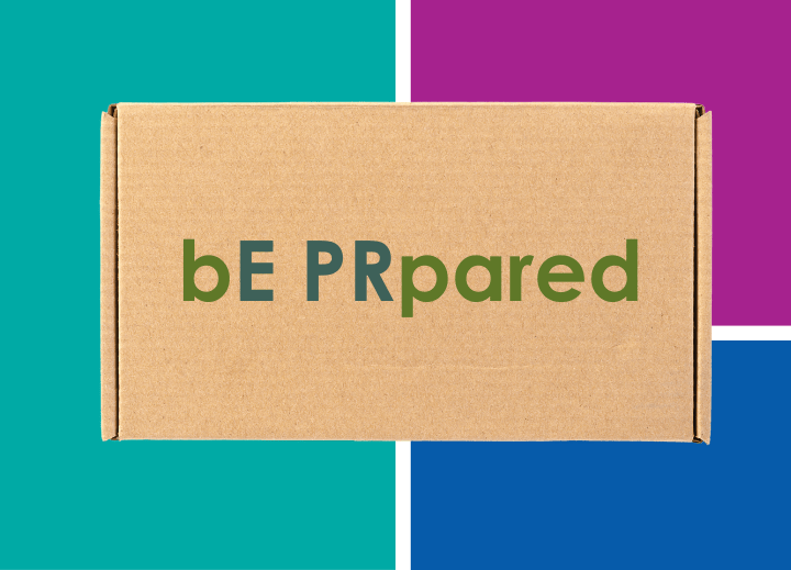 A brown cardboard box with text bE PRepared in green on a colour block background 