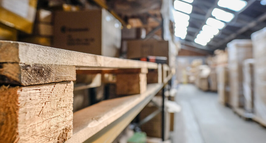 Wooden pallets stacked in a warehouse