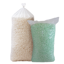 Image shows two packs of packing peanuts, also called packing chips or loosefill. One bag contains white packing peanuts, wile the other contains green packing peanuts.