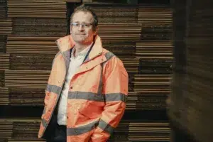 Image shows David Patton, Macfarlane Packaging's head of sustainability, wearing an orange high visibility jacket