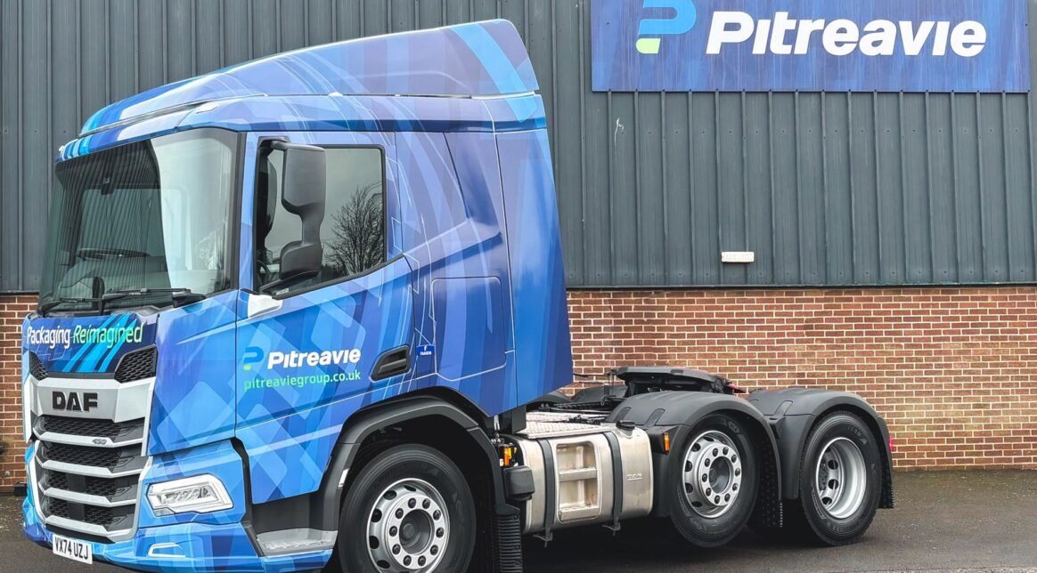 Macfarlane Group PLC acquires The Pitreavie Group Limited - image shows a blue Pitreavie truck in front of the a Pitreavie site.