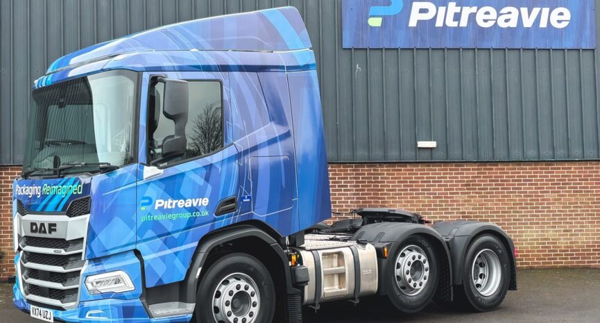 Macfarlane Group PLC acquires The Pitreavie Group Limited - image shows a blue Pitreavie truck in front of the a Pitreavie site.